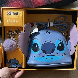 Disney Stitch Face Crossbody Bag in Lavender and Blue with Pom Charm